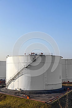 tank in tank farm with blue sky