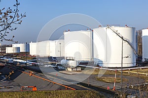 tank in tank farm with blue sky