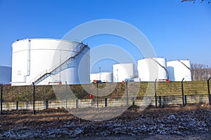 tank in tank farm with blue sky