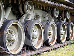Tank tread and road wheels