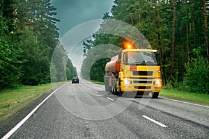 Tank Truck Or Tanker Truck, Transporting Gasoline On Country Road