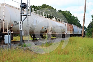 Tanker Cars Rolling Past