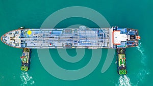 Tanker ship loading in port view from above, Tanker ship logistic import export business and transportation, Aerial view