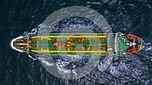 Tanker ship logistic and transportation business oil and gas industry in open sea, Aerial view