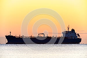 Tanker ship at sunset