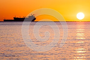 Tanker ship at sunset