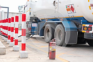 Tanker Transeferring Gas into gas station