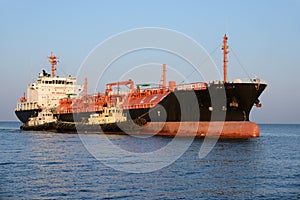 Tanker and tugboat
