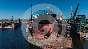 Tanker vessel repair in dry dock Shipyard, Drone shot