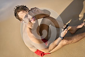 Tanned guy on beach