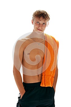 Tanned man with towel