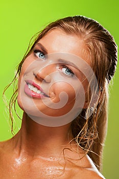 Tanned wet girl smiling