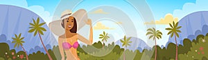 Tanned Woman In Bikini Over Tropical Forest Background, Girl Wear Hat On Summer Sea Vacation