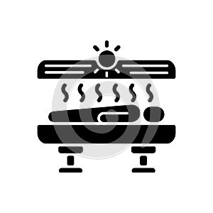 Tanning black glyph icon