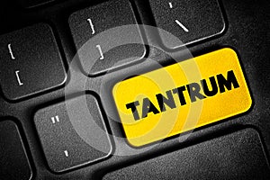 Tantrum - is an emotional outburst, usually associated with those in emotional distress, text button on keyboard, concept