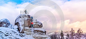 Tanvaldsky Spicak Mountain with rock view point at winter time, Czech Republic