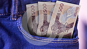 Tanzania 5000 Shillings Banknotes in Pocket of Jeans