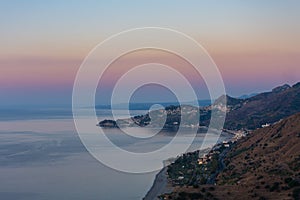 Taormina Bay at dawn seen from Forza D`AgrÃÂ²