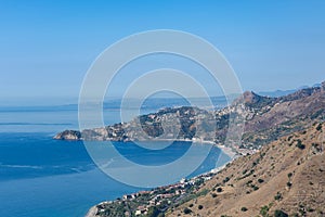 Taormina Bay in a summer day seen from Forza D`AgrÃÂ², Sicily