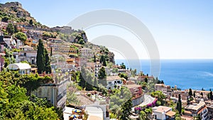 Taormina city skyline from Castelmola village photo