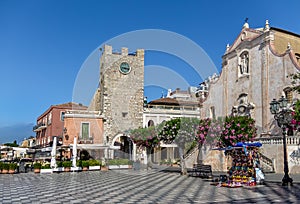 Taormina main square with San Giuseppe Church and the Clock Tower - Taormina, Sicily, Italy