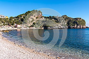 Taormina - Panoramic view from beach Spiaggia di Isola Bella in Taormina, Sicily, Italy, Europe, EU.