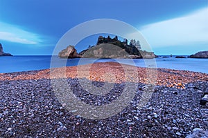 Taormina, Sicily: Beautiful Isola Bella at dusk