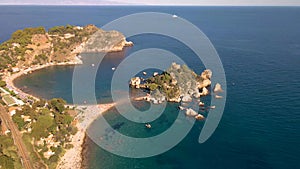 Taormina Sicily Isola Bella beach from the sky aerial view voer the Island and the beach by Taormina Sicily Italy