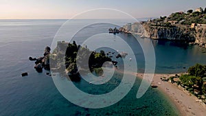 Taormina Sicily Isola Bella beach from the sky aerial view voer the Island and the beach by Taormina Sicily Italy