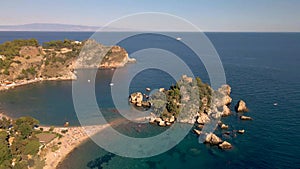 Taormina Sicily Isola Bella beach from the sky aerial view voer the Island and the beach by Taormina Sicily Italy