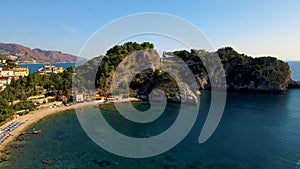 Taormina Sicily Isola Bella beach from the sky aerial view voer the Island and the beach by Taormina Sicily Italy