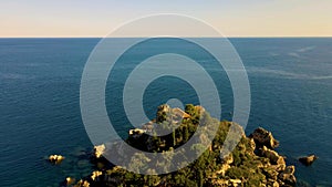 Taormina Sicily Isola Bella beach from the sky aerial view voer the Island and the beach by Taormina Sicily Italy