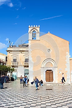 Taormina, Sicily, Italy - Apr 8th 2019: People on the Piazza IX Aprile Square in beautiful historical center of the Italian city.