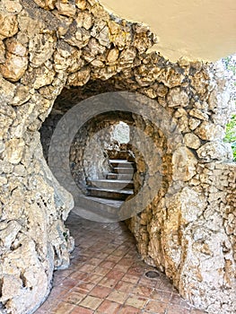 Taormina, Sicily, Italy. Taormina, Sicily, Italy. Stone caves carved in the Isola Bella island