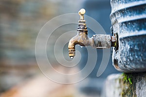 Tap attached to a water tank