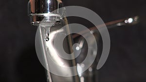 Tap dripping water waste