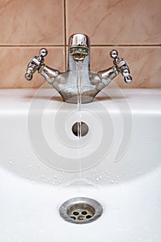 Tap with Water Flowing Slowly
