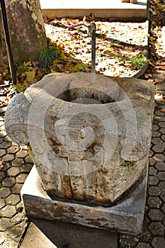 Tap with water with the mark of Croatian cultural heritage votive cross