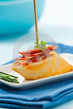 Tapa with serrano ham photo