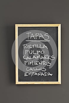 Tapas advertised on a blackboard