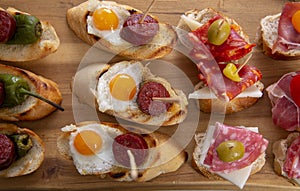 Tapas appetizers on table - view from above