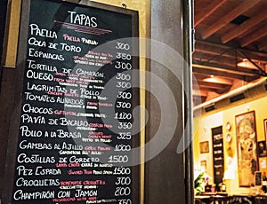 Tapas bar in Spain. Spanish tapas bar in historical center of Seville at night