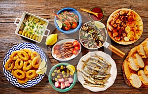 Tapas seafood clams shrimps calamari anchovies