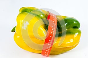 Tape measure around pepper