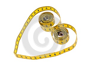 Tape measure heart shape - health, weight concept photo