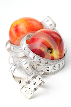 Tape measure and nectarines