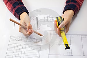 Tape measure and pencil
