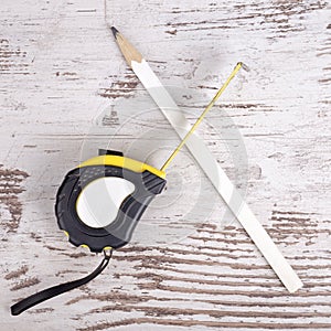 Tape measure and pencil