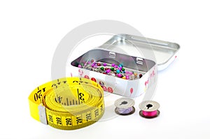 Tape measure pins and bobbins