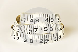 Tape measure showing inches for personal measuring.